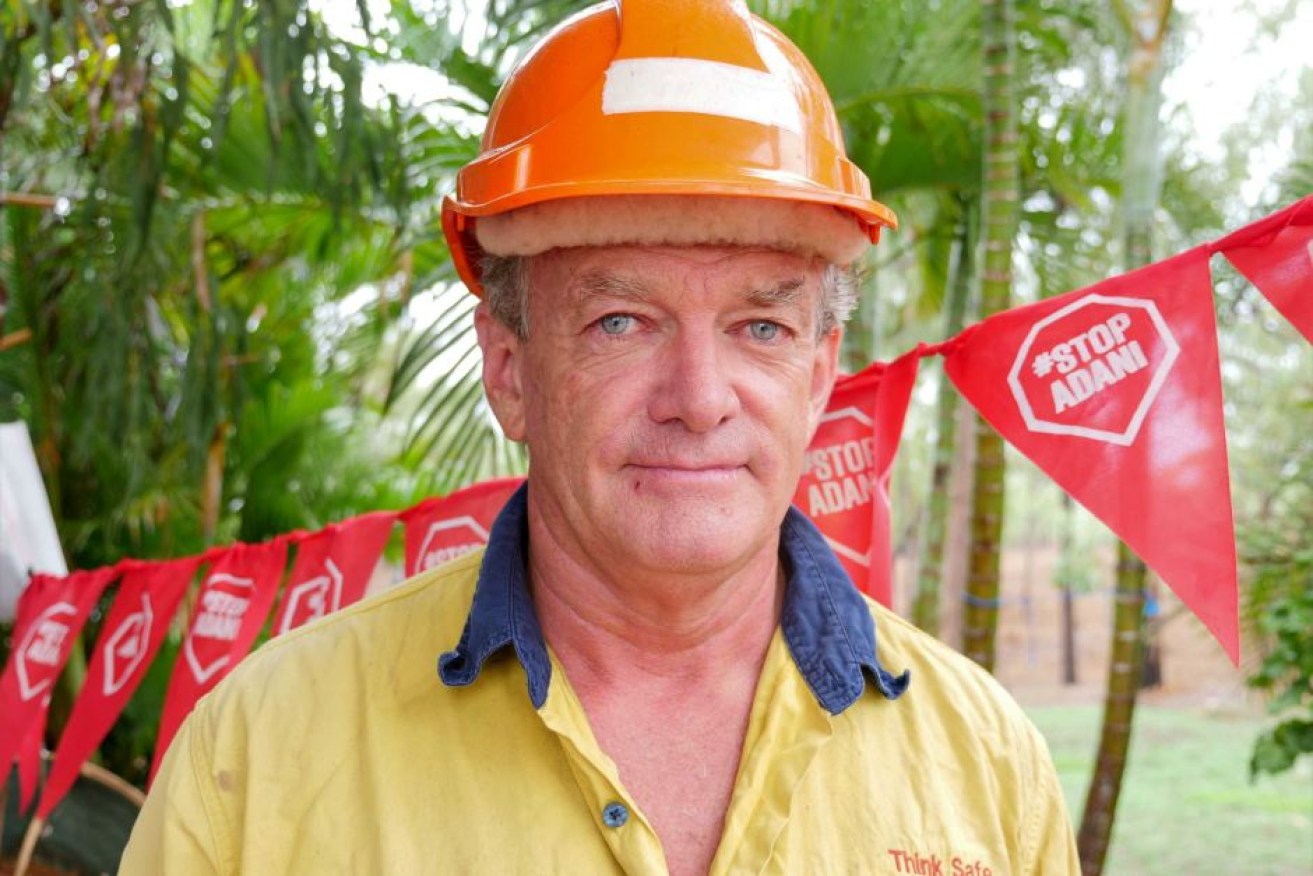 Grant Howard works in a coal mine, but is also concerned about climate change. (ABC Tropical North: Angel Parsons)