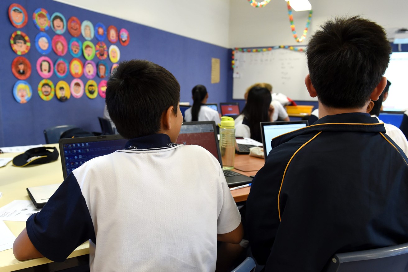 Queensland school internet standards are vastly slower than in NSW. (Paul Miller/AAP PHOTOS)