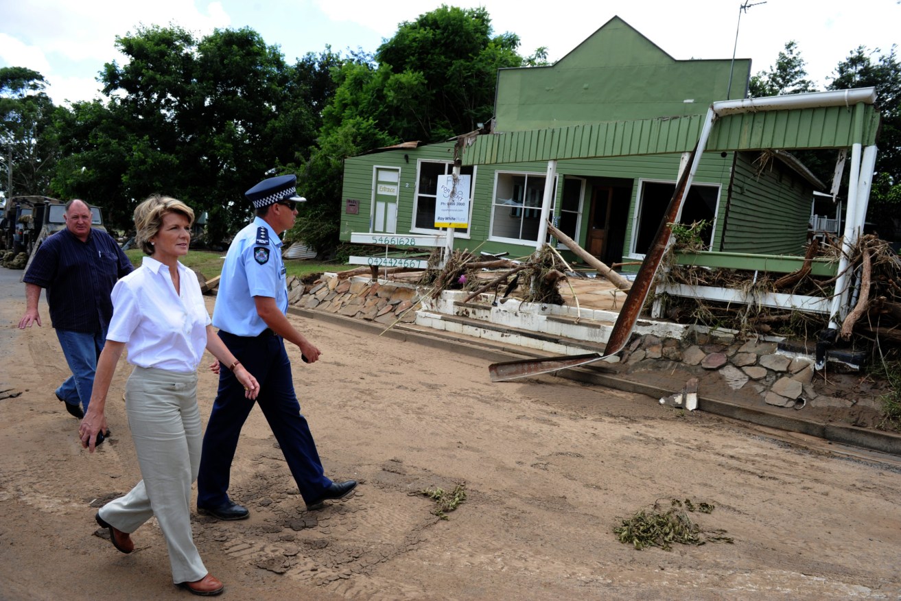 then-federal deputy opposition leader Julie Bishop tours the township of Grantham following the devastating floods that ripped through the Lockyer Valley in January 2011. (Photo: AAP Image/Dean Lewins) 