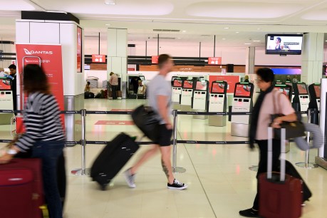 Qantas halts all overseas flights, lays off 20,000 staff until end of May