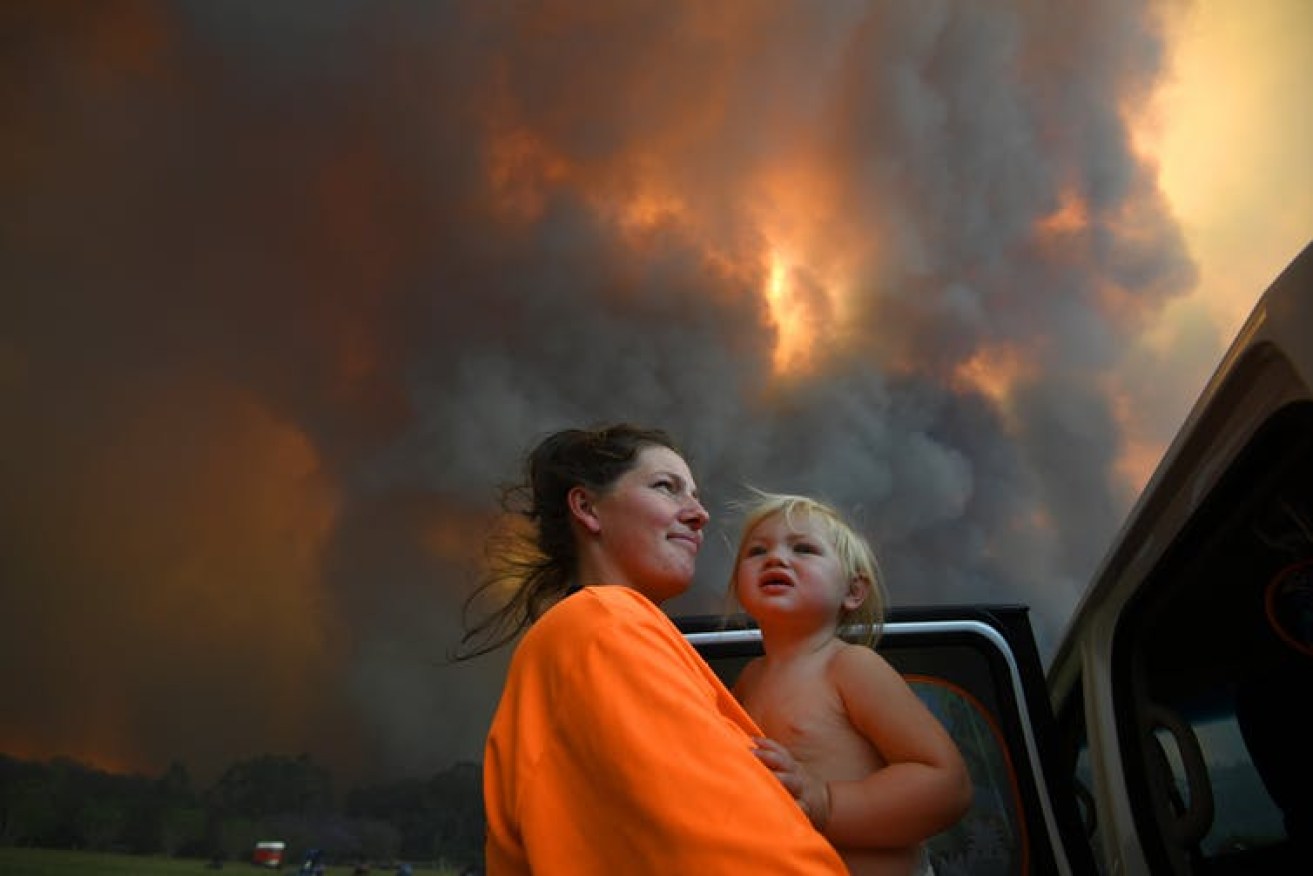 Suncorp has paid out $227 million to bushfire communities. (Photo: Dan Peled/AAP)