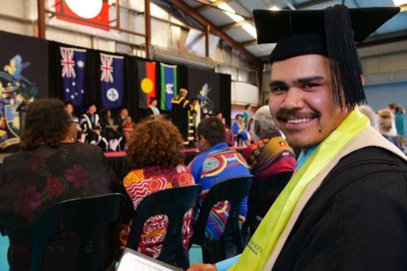 Woorabinda graduate Campbell Bounghi never thought he would attend university after dropping out of high school. Photo: ABC