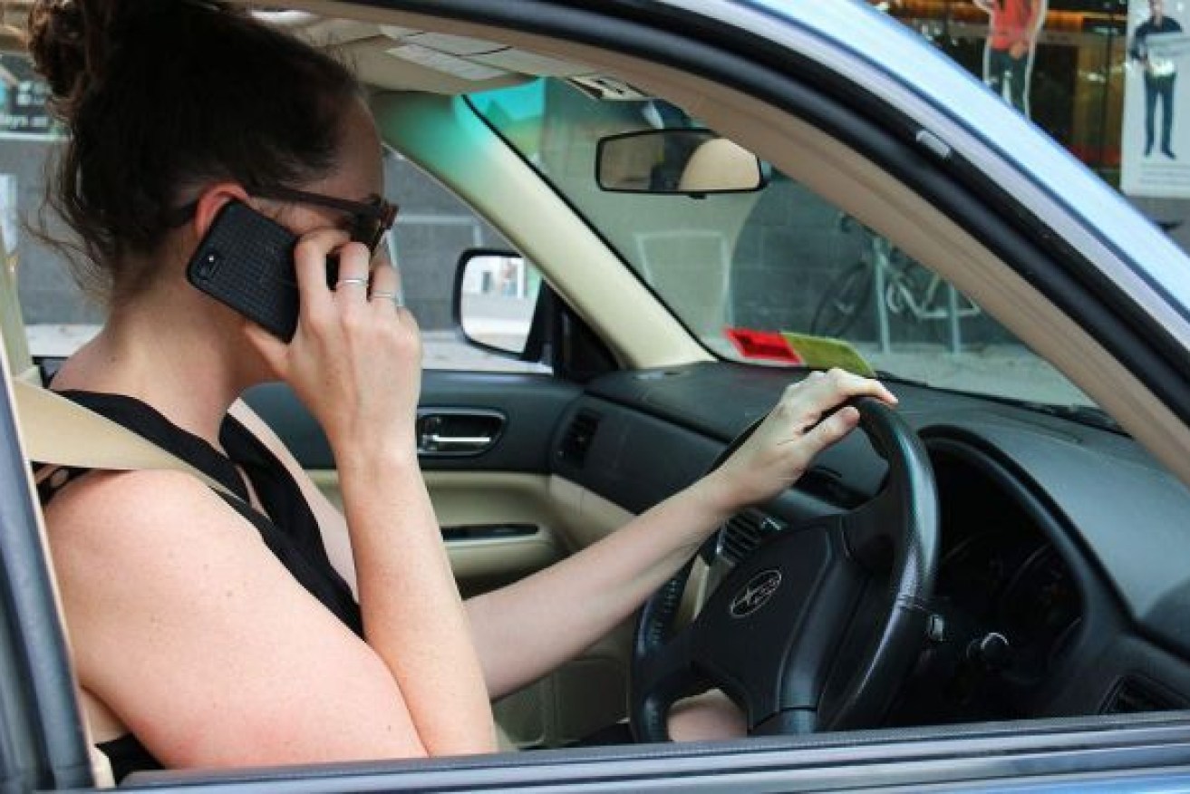 Police say the new penalties reflect the danger posed by using a mobile phone while driving. Photo: ABC