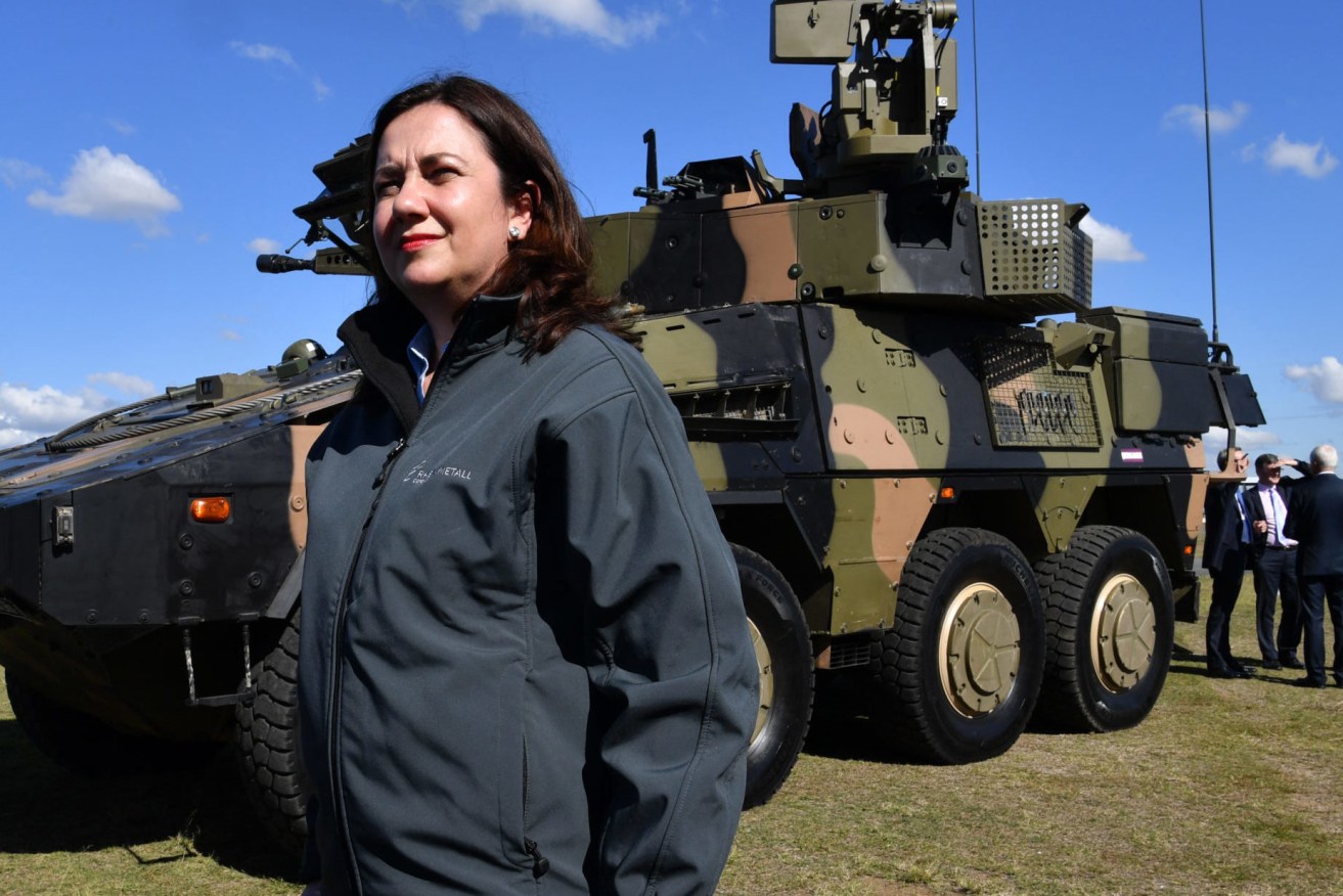  An archived image of Premier Annastacia Palaszczuk inspecting military equipment in Queensland. (AAP Image/Darren England)