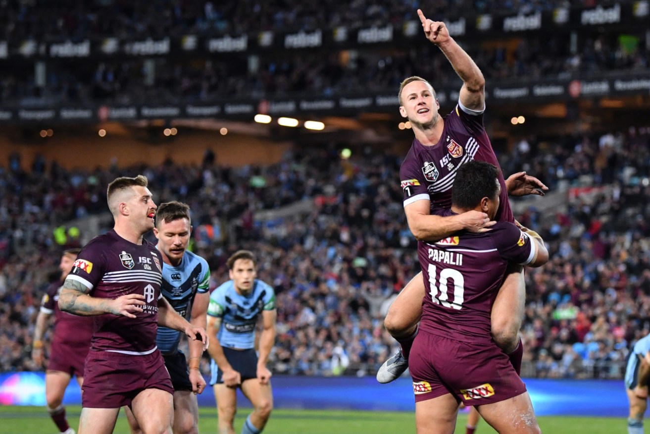 Josh Papalii of the Maroons celebrates with Daly Cherry-Evans after scoring a try during Game 3 of the 2019 State of Origin series 9. (AAP Image/Joel Carrett)