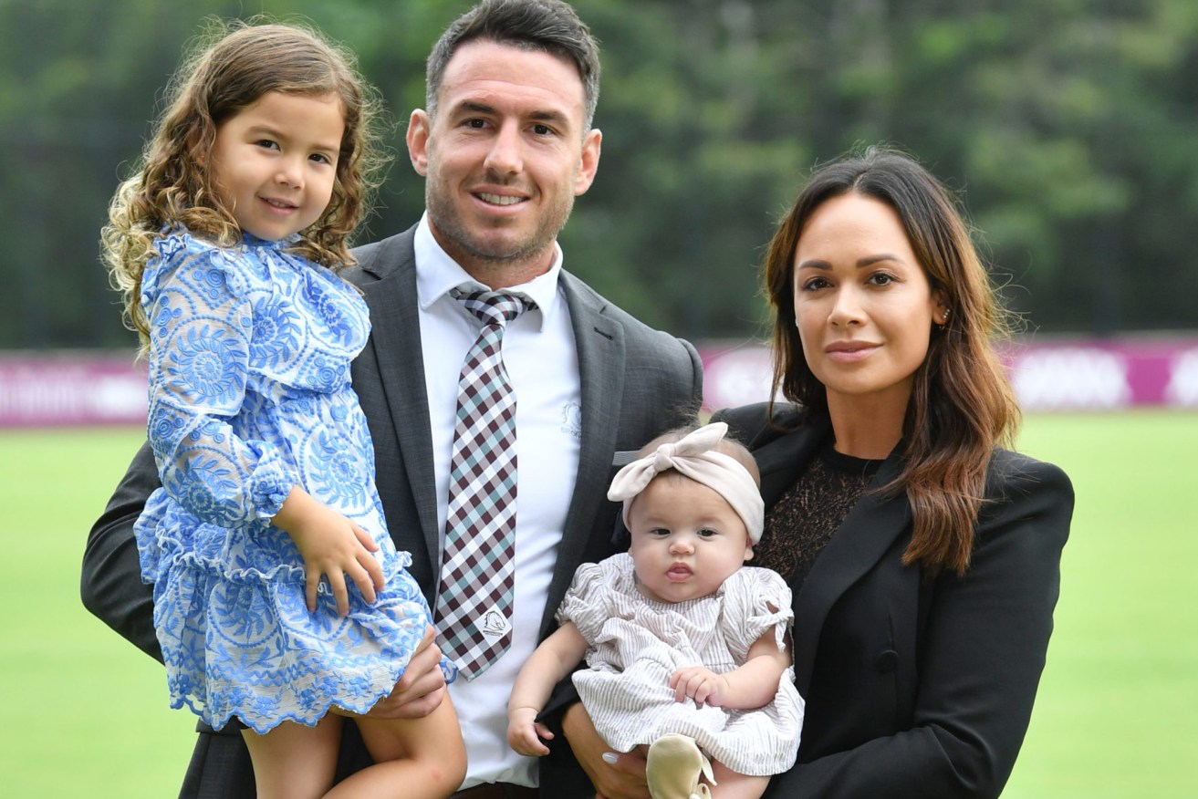 Brisbane Broncos player Darius Boyd with his wife Kayla and children Willow and Romi after announcing his retirement from the NRL earlier this year. (Photo: AAP Image/Darren England)