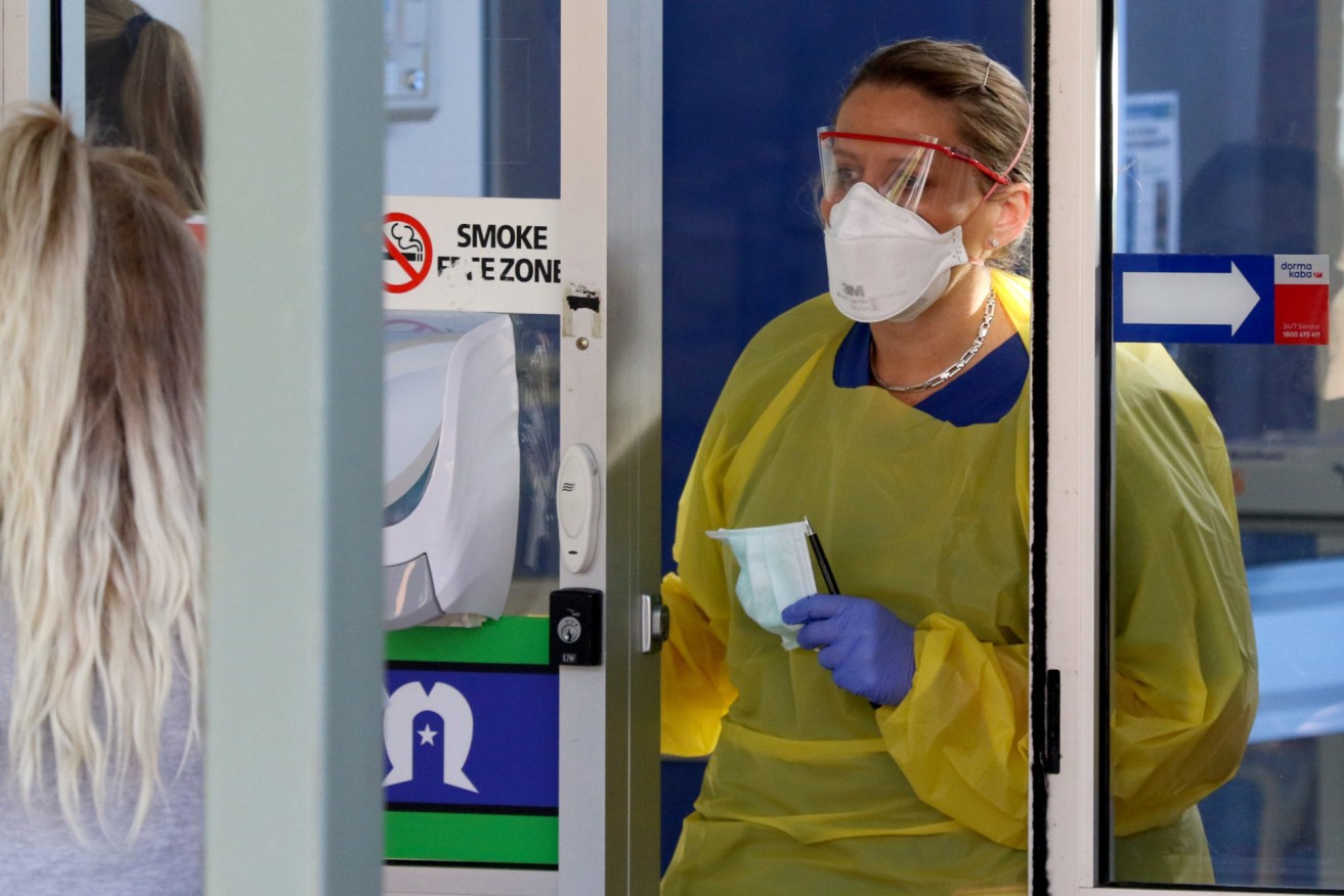 Queensland Health has repeatedly stated that there are sufficient supplies of PPE for the state’s public hospital system however frontline workers remain concerned they are being put at additional risk.  (Photo: AAP Image/Kelly Barnes) 