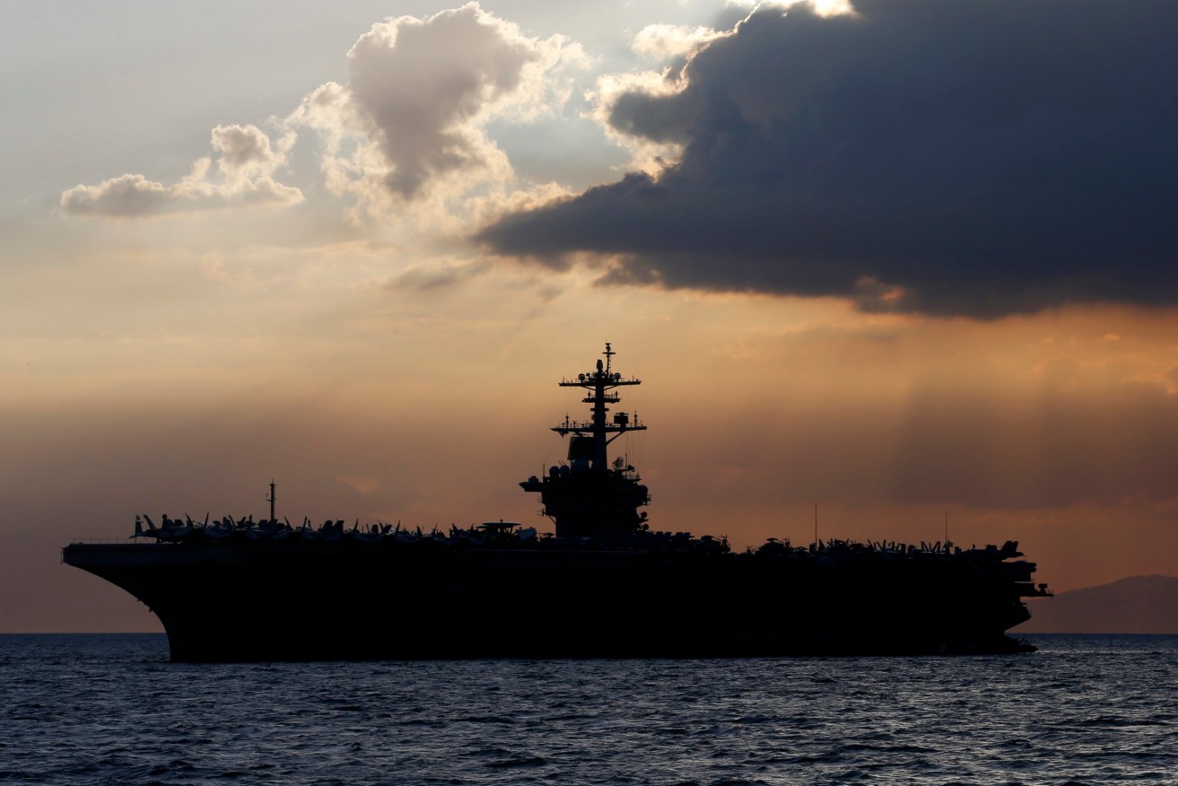 USS Theodore Roosevelt. (AP Photo/Bullit Marquez, File)