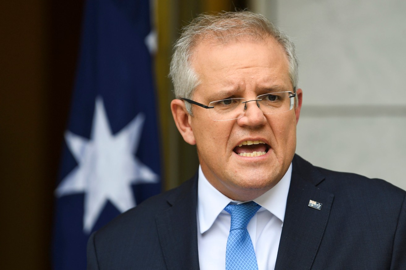 Prime Minister Scott Morrison wants to set a vaccination threshold at which lockdowns will no longer apply. (AAP photo)..