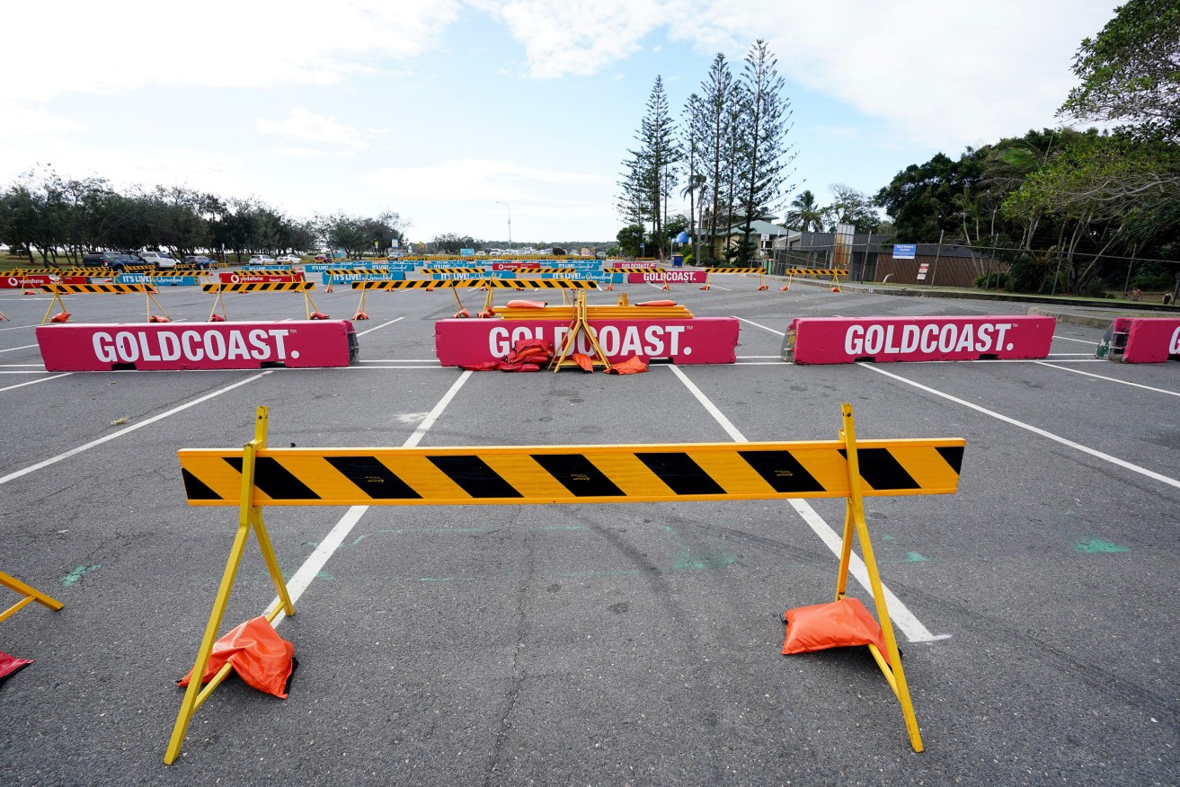 Barricading is seen at The Spit car park on the Gold Coast, Tuesday, April 7, 2020. . (AAP Image/Dave Hunt) NO ARCHIVING