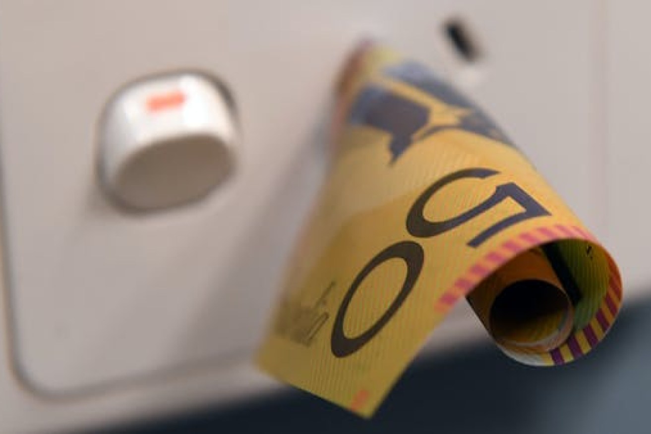 Regional Queenslanders will save $84 a year on power bills. (Photo: Julian Smith/AAP)