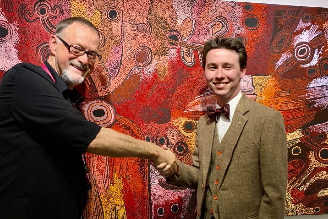 David Hinchliffe, left, with USQ art coordinator Brodie Taylor, has lent out much of his private collection of Indigenous art.   