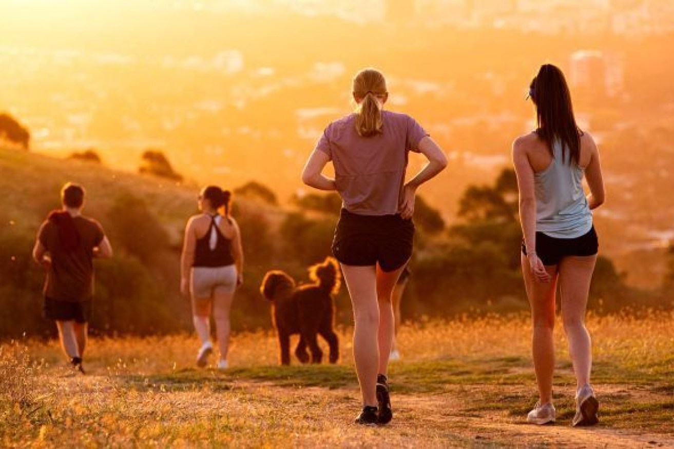 Federal Government guidelines allow people to exercise in pairs or in household groups. Photo: ABC