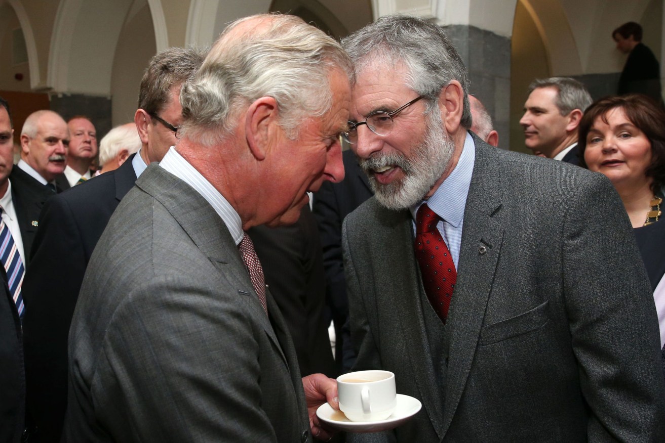 Britain's Prince Charles. left, shakes hands with Sinn Fein president Gerry Adams at the National University of Ireland in Galway, Ireland, in May, 2015. (Photo: Brian Lawless/Pool photo via AP)