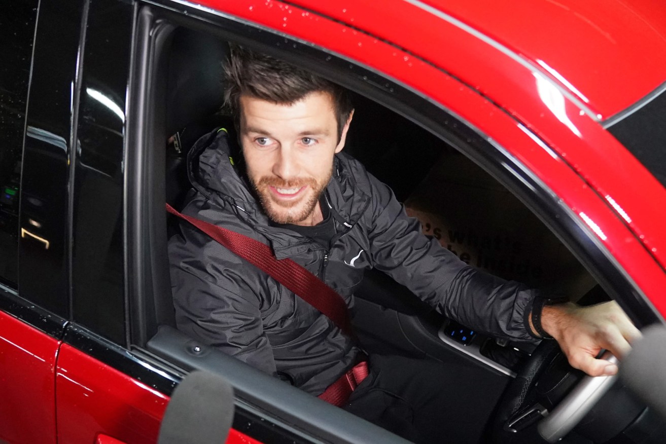 Trent Cotchin of the Richmond Tigers Football Club leaves in his car after being tested for Coronavirus (COVID-19) at Marvel Stadium in Melbourne, Wednesday, May 13, 2020. All AFL players must be tested for COVID-19 before training in full squads can resume. (Photo: AAP Image/Scott Barbour) 
