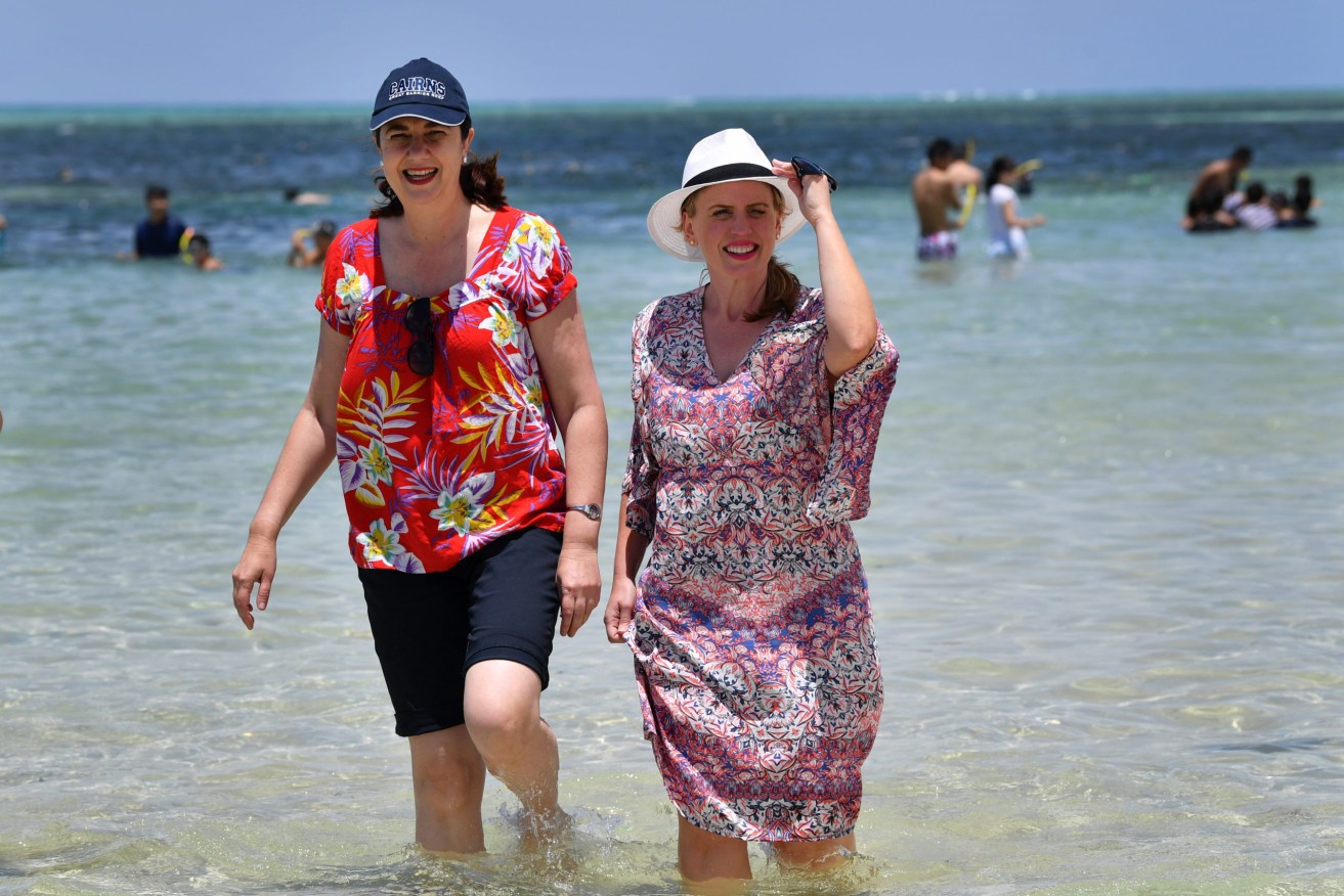 Queensland Premier Annastacia Palaszczuk (left) and Minister for Tourism Kate Jones during a previous tourism visit to Cairns.  (Photo: AAP Image / Darren England) 