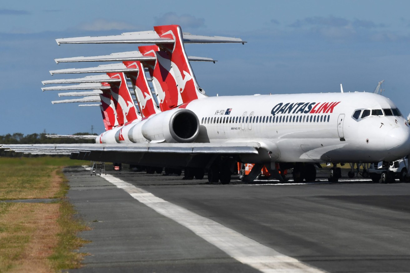 Grounding a huge part of our airline fleets has helped slash emissions. (Photo: AAP Image/Darren England)