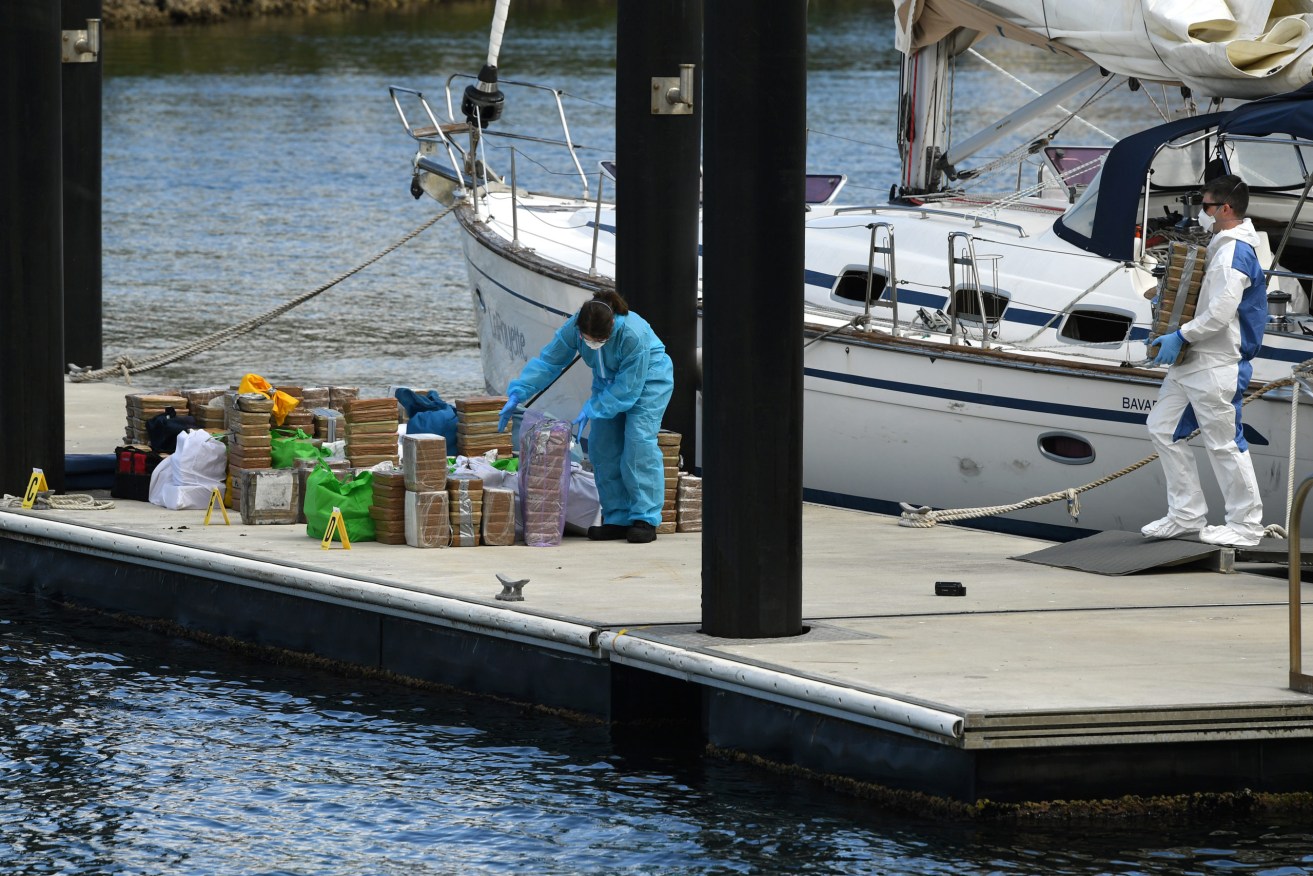 Police remove a large amount of methamphetamine from a yacht docked at Balmain in Sydney. (Photo: AAP Image/Joel Carrett) 