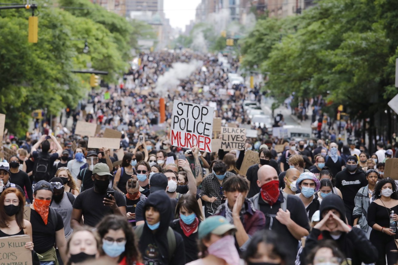 Protesters march on New York City's First Ave during a demonstration over the arrest in Minnesota of George Floyd, who died in police custody.  (Photo: EPA/JUSTIN LANE)