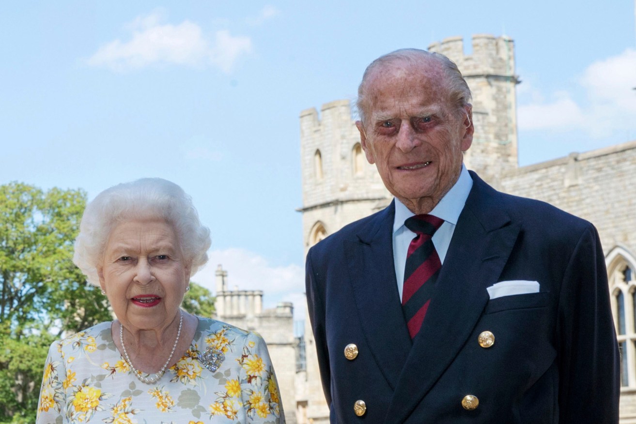 Britain's Queen Elizabeth II with Prince Philip, the Duke of Edinburgh. (Photo: Steve Parsons/Pool via AP)