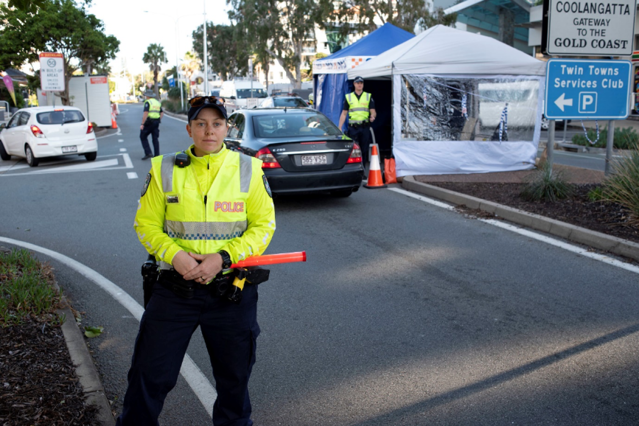 Senior Constable working at the Queensland border in May 2020. (Photo: Steve Holland)