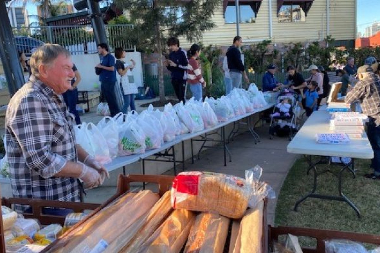 Brisbane food charities have been swamped with people in need during the pandemic. (Photo: ABC)