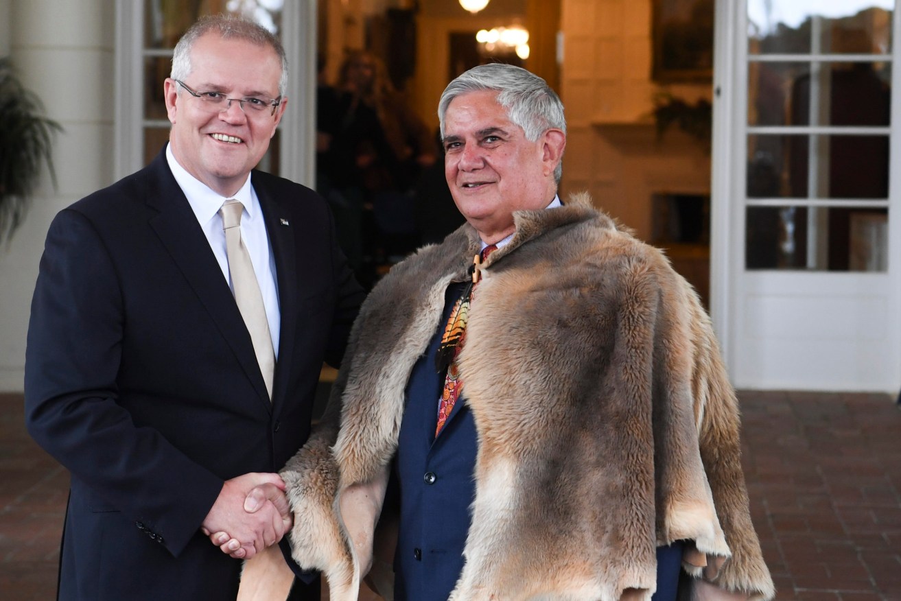 Member for Hasluck and Minister for Indigenous Australians Ken Wyatt (right) poses for a photograph with Australian Prime Minister Scott Morrison. (Photo: AAP Image/Lukas Coch)