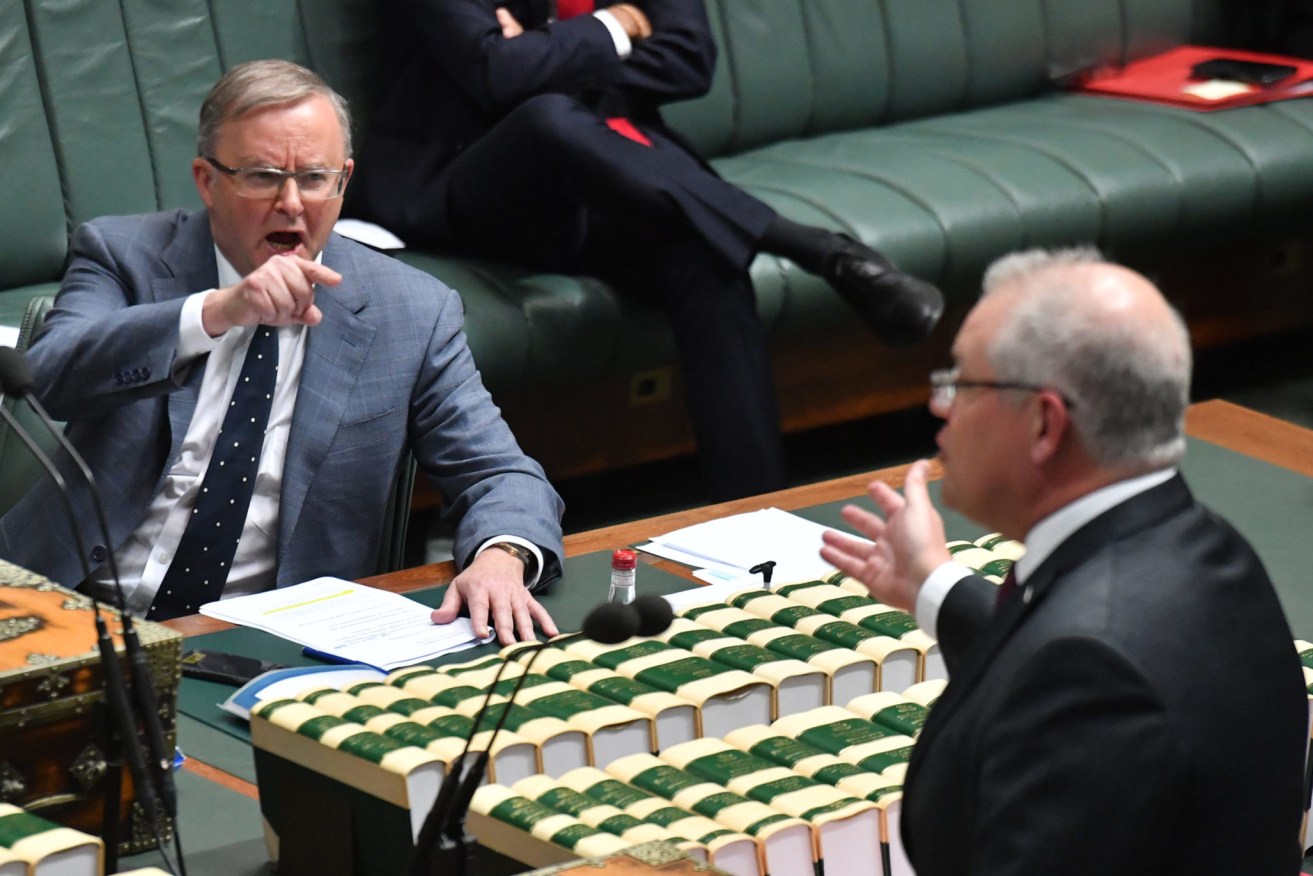 Opposition Leader Anthony Albanese and prime Minister Scott Morrison are neck and neck in the polls. (Photo: AAP Image/Mick Tsikas) 