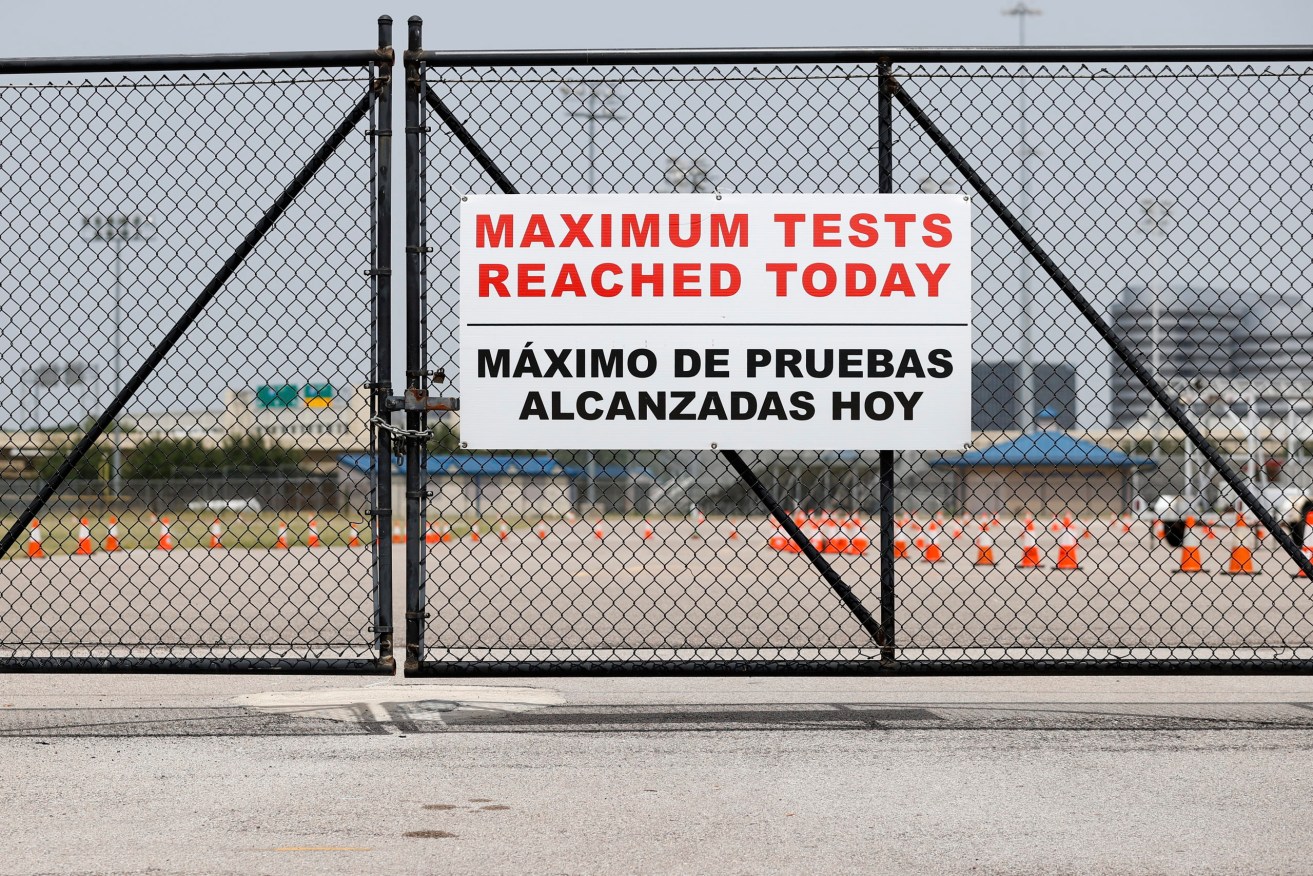 A sign posted "Maximum Tests Reached Today" in English and Spanish is seen at Delmar Stadium at a COVID-19 testing site in Houston, Texas, where cases continue to surge.  (Photo: EPA/AARON M. SPRECHER)