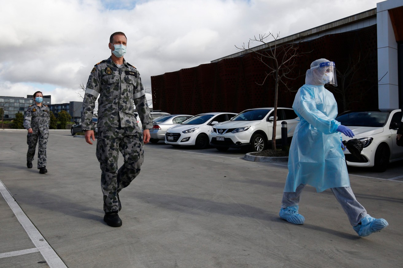 ADF staff arrive at Epping Gardens Aged Care Facility in Epping, Melbourne. More coronavirus deaths of aged care residents are expected in coming days as Victoria's troubling infection rates continue to spike. (Photo: AAP Image/Daniel Pockett) 