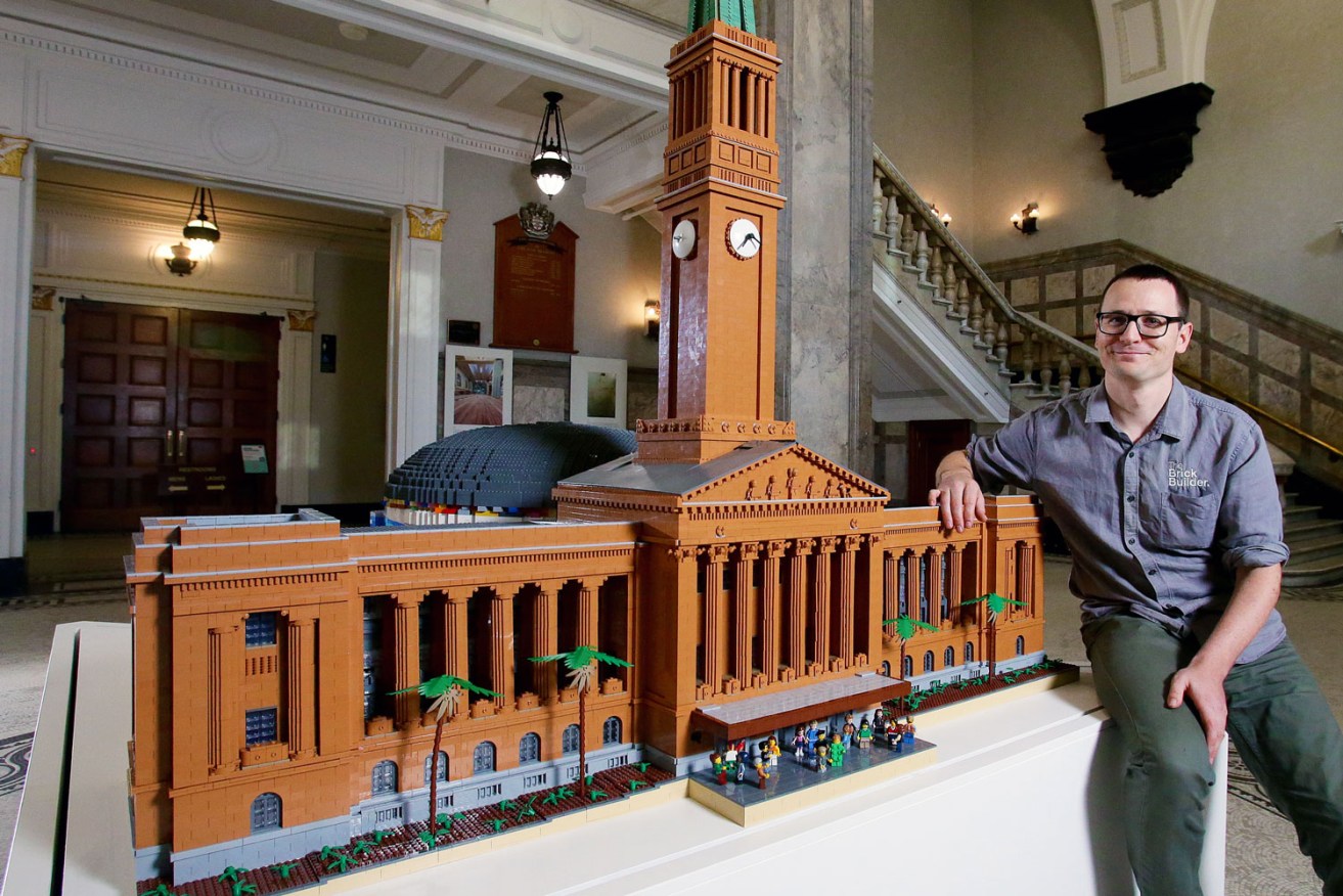 Ben Craig with his reconstruction of Brisbane City Hall. (Photo: Supplied)