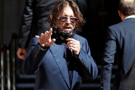 Johnny Depp tells libel trial he never hit Amber Heard