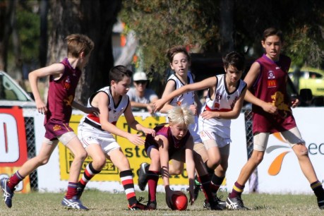 Football frenzy: AFL’s Queensland blitz spurs growth in junior ranks