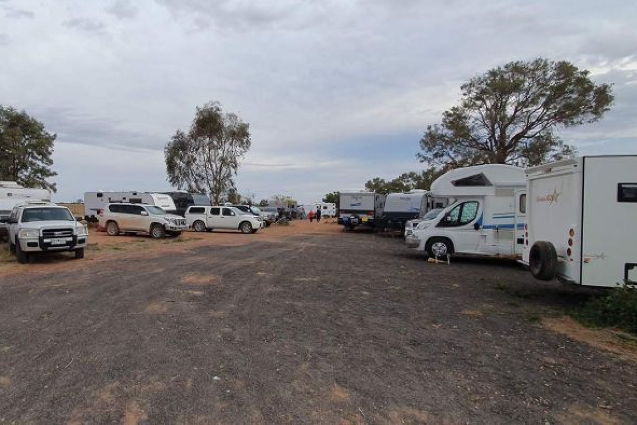 Travellers wait it out at the Queensland-New South Wales border. Photo: ABC