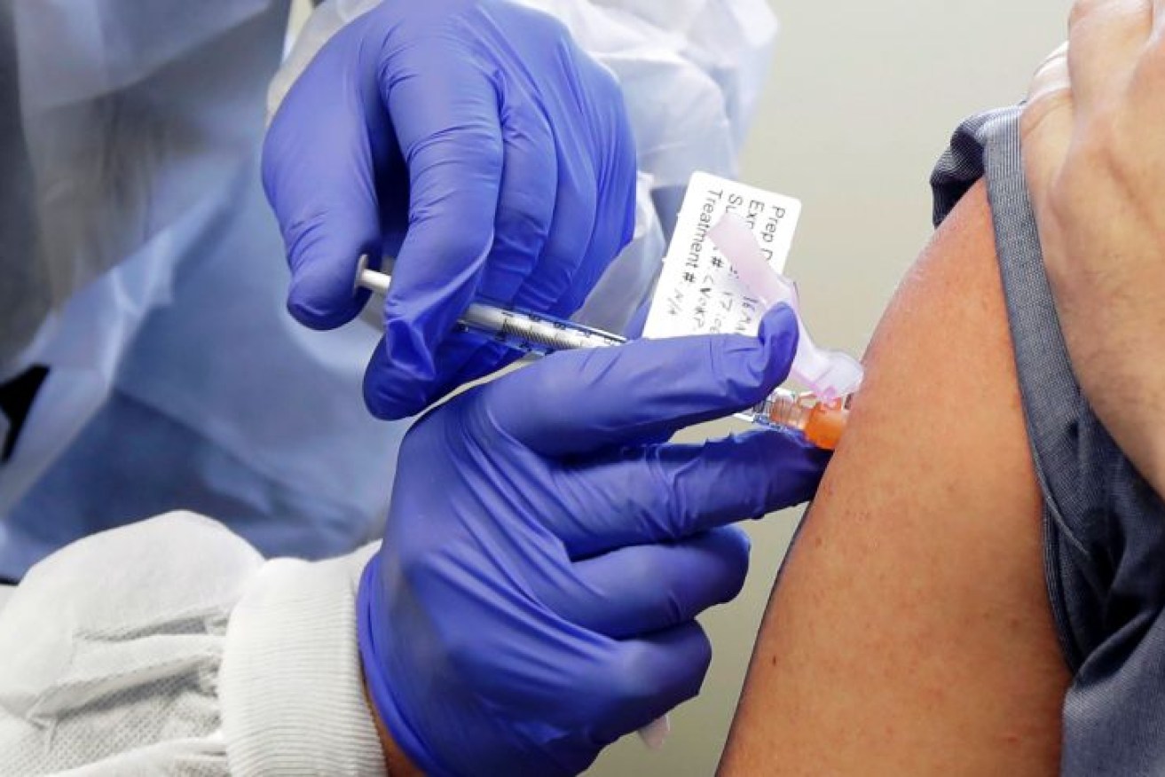 Telstra will pay staff $200 to get vaccinated (Photo: AP: Ted S. Warren)