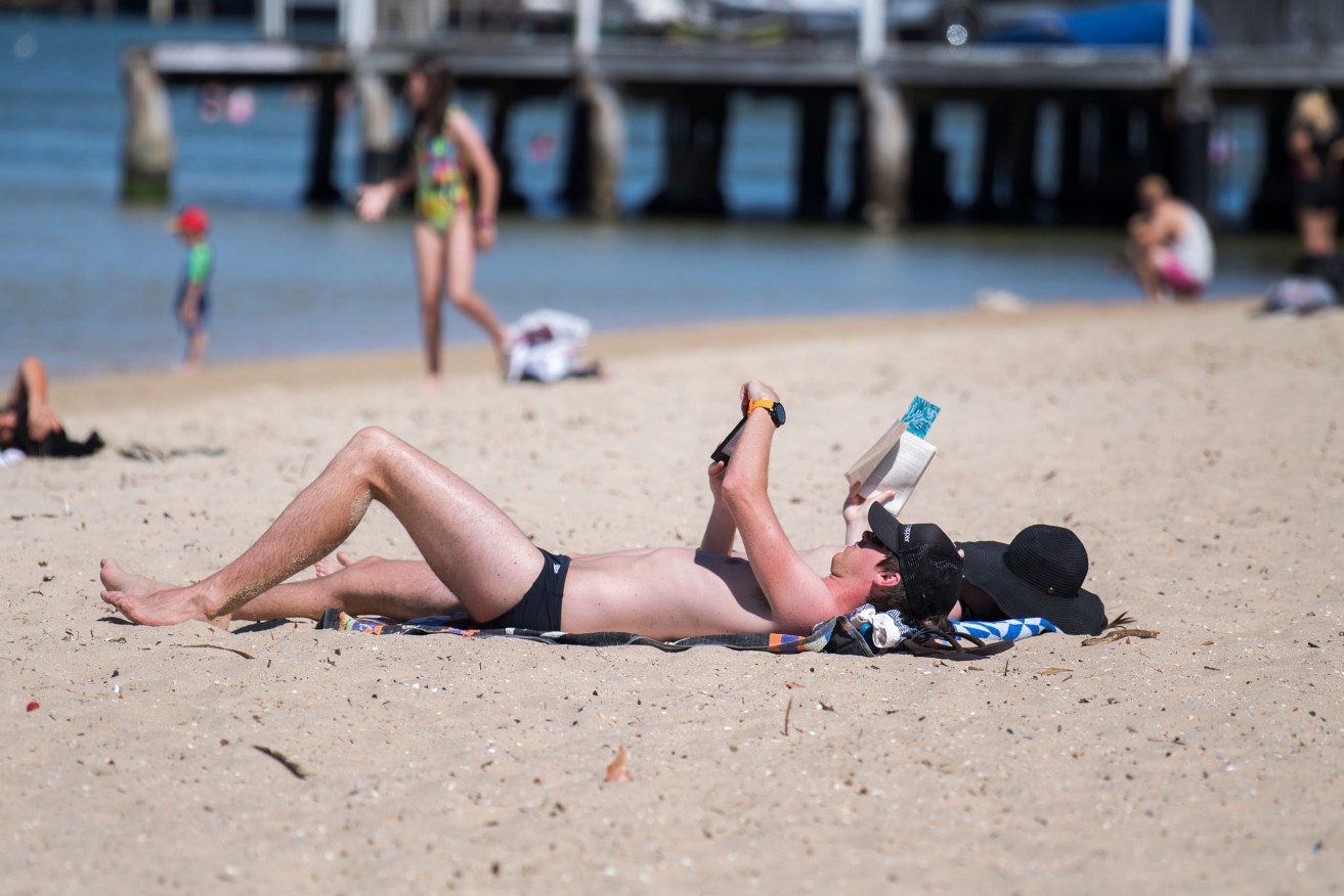 Australians are being urged to use a new risk calculator to measure their vulnerability to melanoma. (Photo: AAP Image/Ellen Smith) 