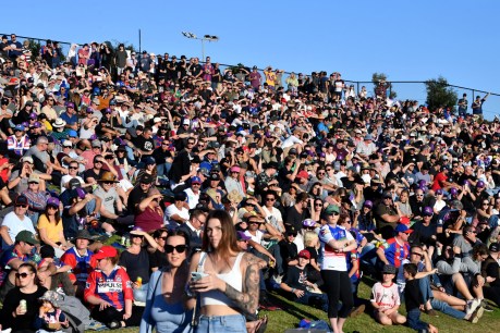 Coast’s perfect day for the footy, but not so great for social distancing
