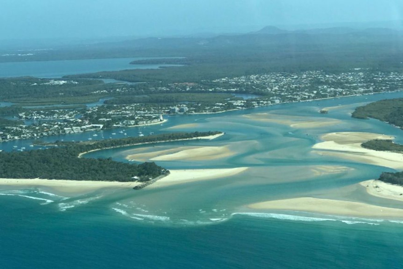 Professor Greg Skilleter, from the University of Queensland, is recommending council dredge open the Noosa River mouth during a rain event. (Picture: Supplied: Seair Pacific)