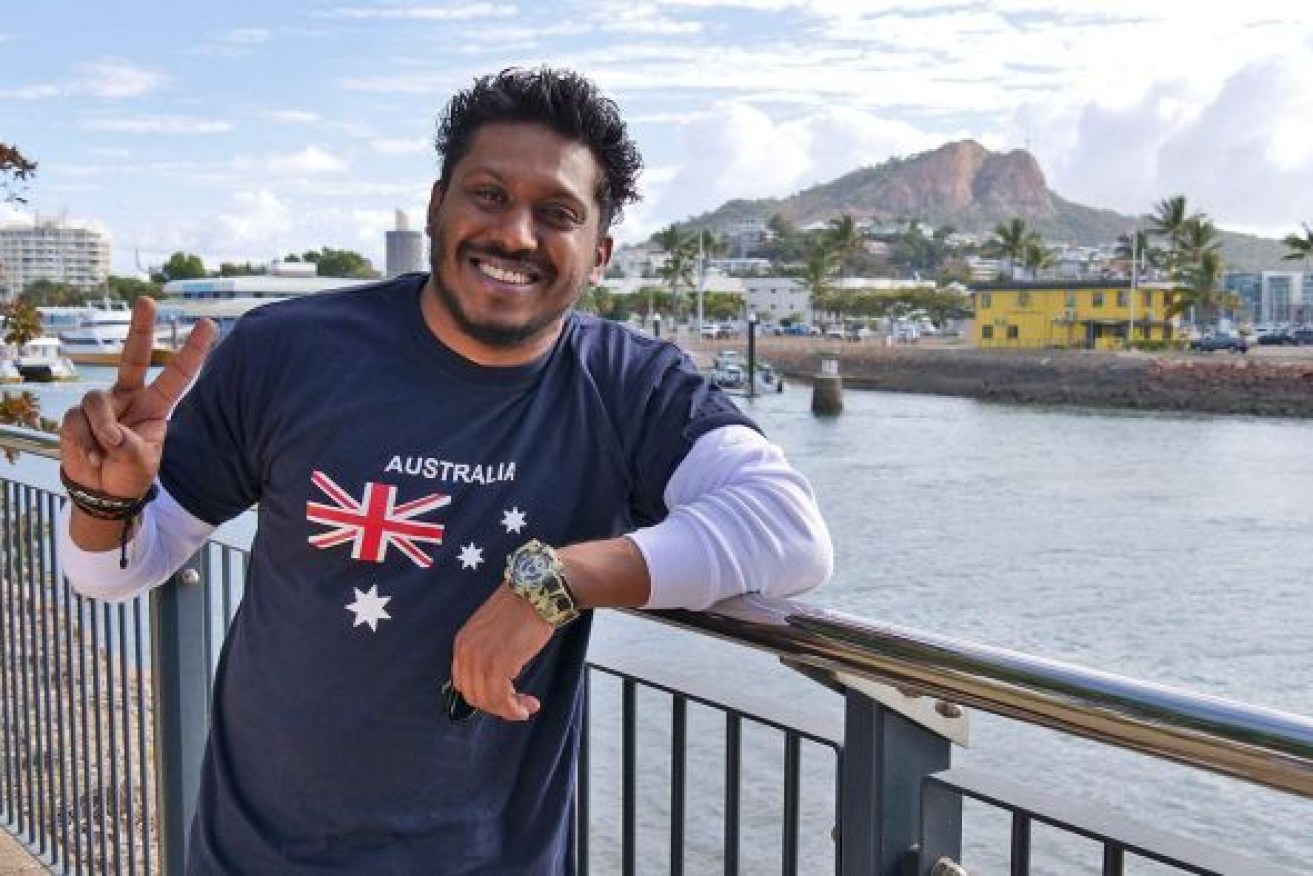 Sri Lankan seafarer Bandara Ranaseha enjoys his first shore leave in Townsville after months at sea. Photo: ABC
