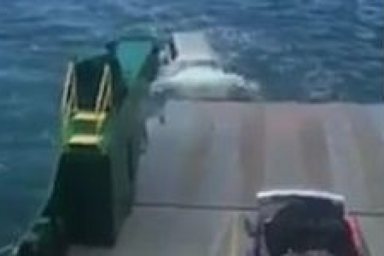 A 4WD has fallen off a barge heading to Fraser Island on New Year's Eve. Photo: ABC