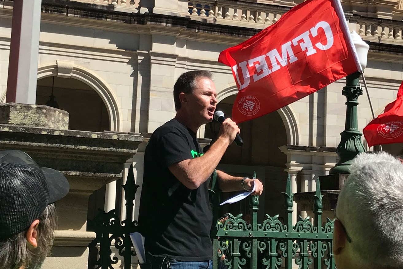 The CFMEU's Michael Ravbar addresses a rally outside Parliament House 