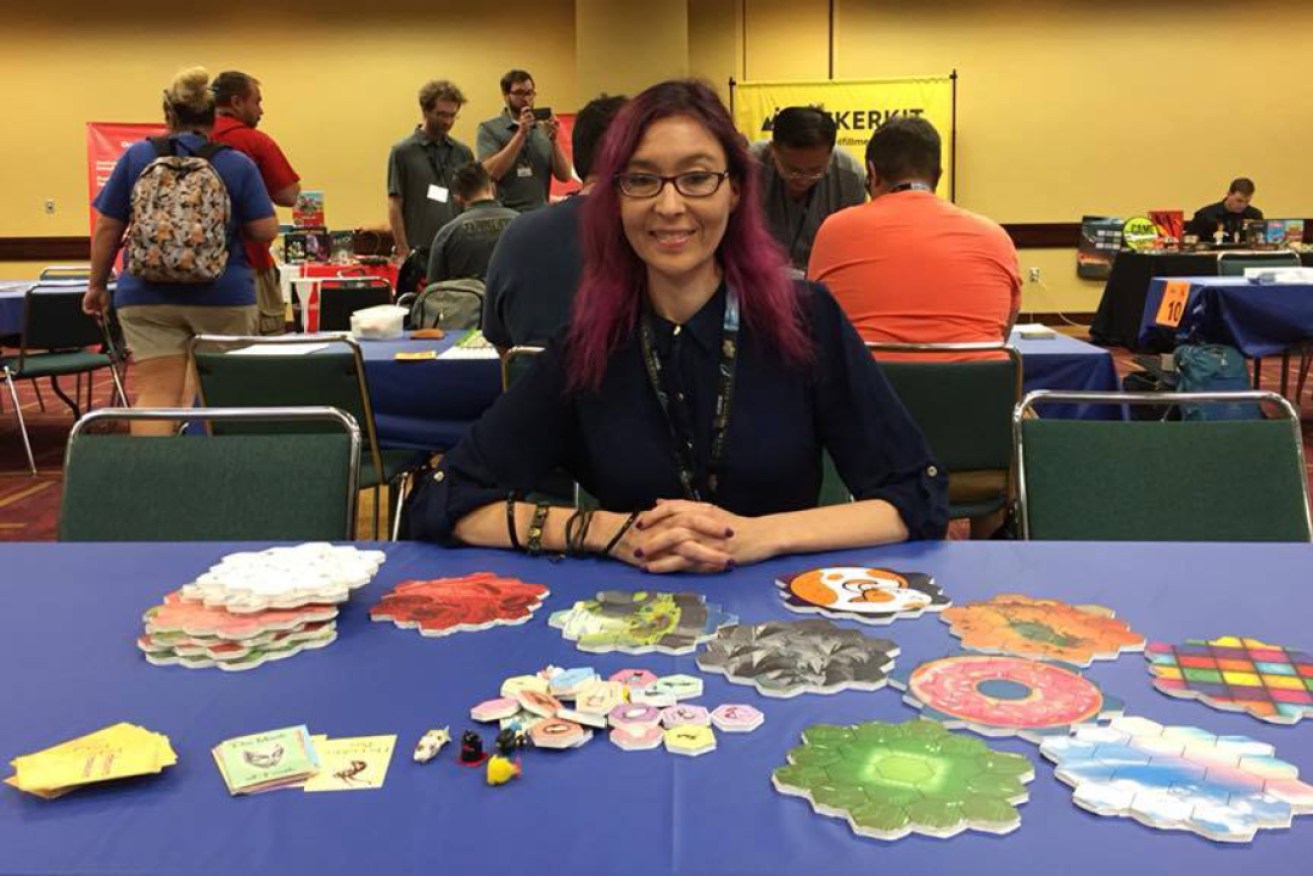 Sally Browne demonstrates one of her games at GenCon in the United States. (Photo: Supplied)