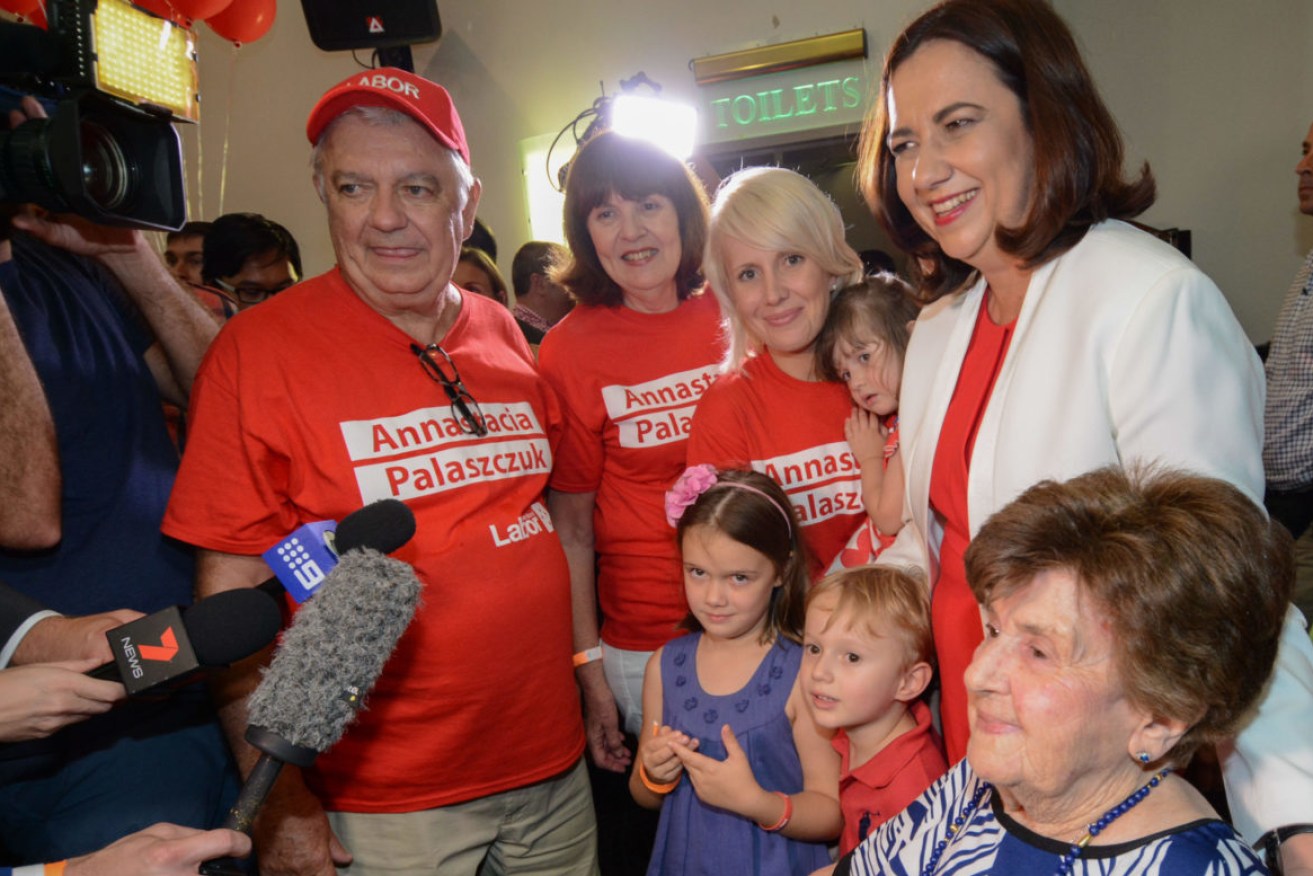 Premier Annastacia Palaszczuk poses with her family including father Henry (L) and grandmother Beryle Erskine (R) at an election night function at Lions Richlands Club after her 2015 election win.  (AAP Image/John Pryke)