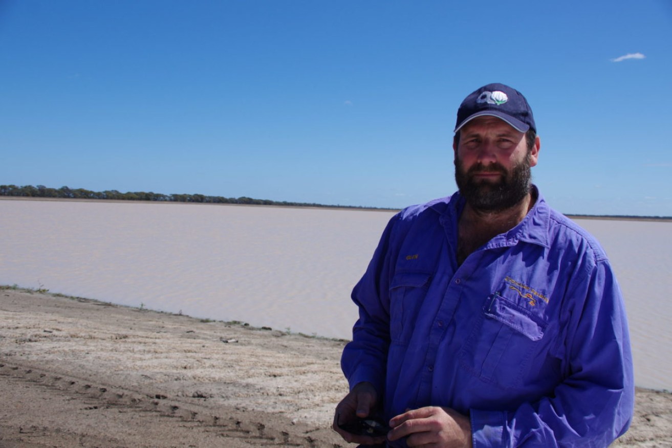 Goondiwindi cotton grower Glen Smith in front of one of his on-farm dam storages.(Photo: Brad Cooper).