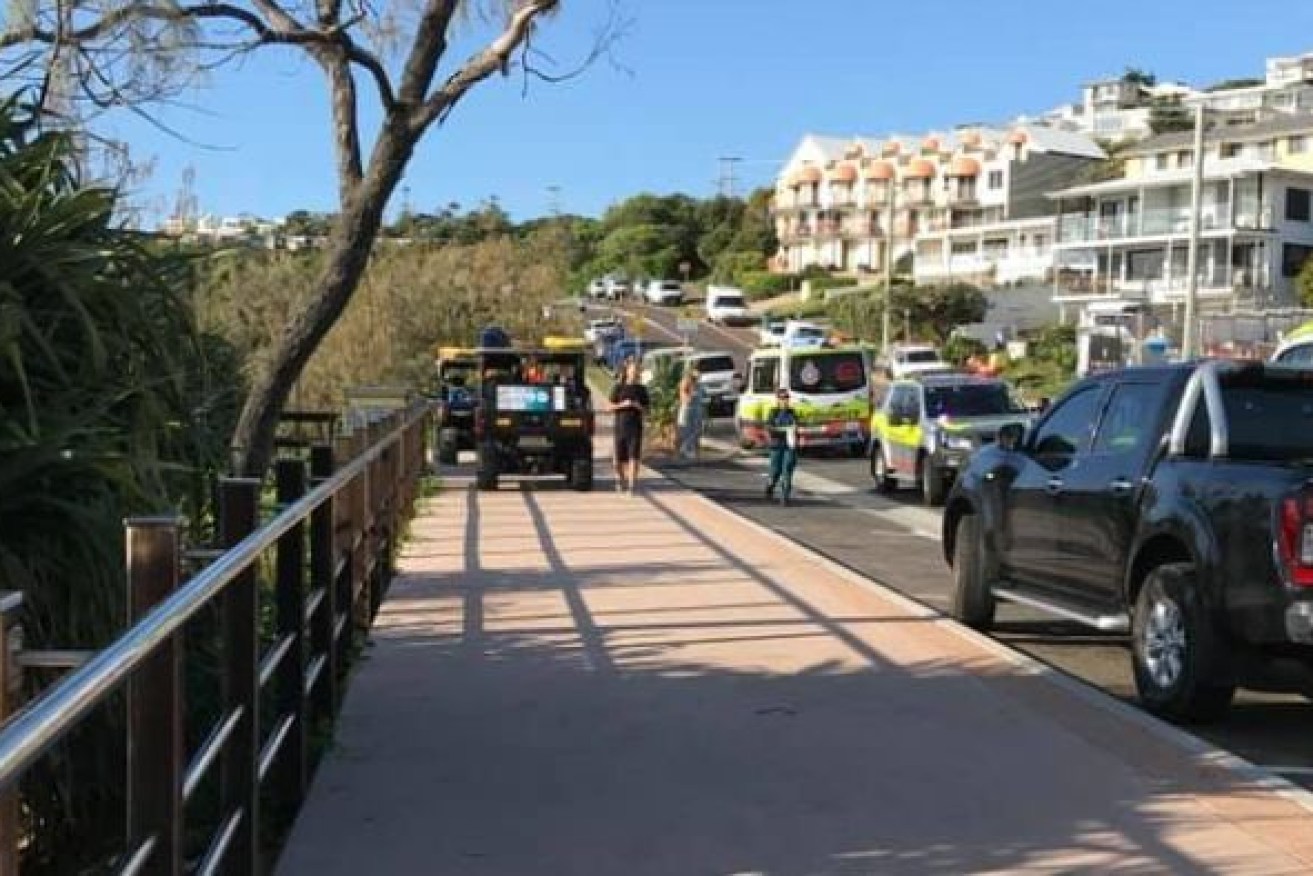 Emergency services responded to reports of a body at Coolum Beach this morning. (Photo: ABC)