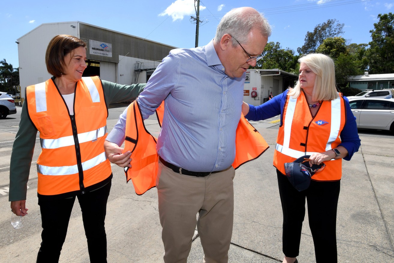 Prime Minister Scott Morrison on the hustings with Queensland LNP leader Deb Frecklington (left) and MP Karen Andrews (right). (Photo: AAP Image/Dave Hunt) 