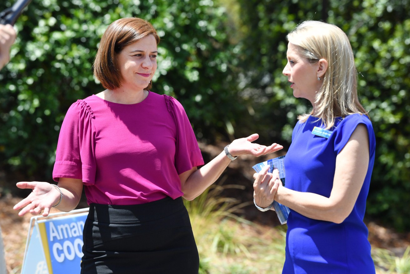 Queensland opposition Leader Deb Frecklington (right) is seen talking to Amanda Cooper (right),  LNP Candidate for Aspley - where the LNP has hopes of gaining a seat from the government. (AAP Image/Darren England) 