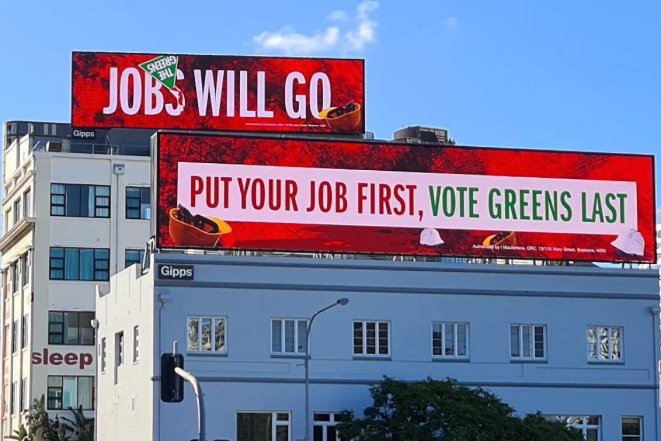 A QRC campaign billboard near the Story Bridge.