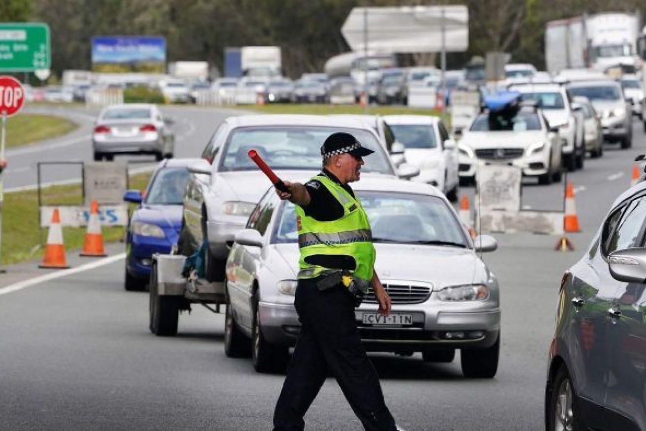 Travellers from NSW will be waved through the Queensland border from December 1. (Photo: ABC)