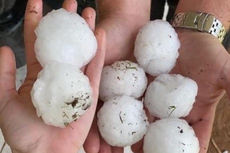 Southeast mops up after giant hail, thousands without power